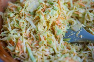 Coleslaw after being mixed with dressing.