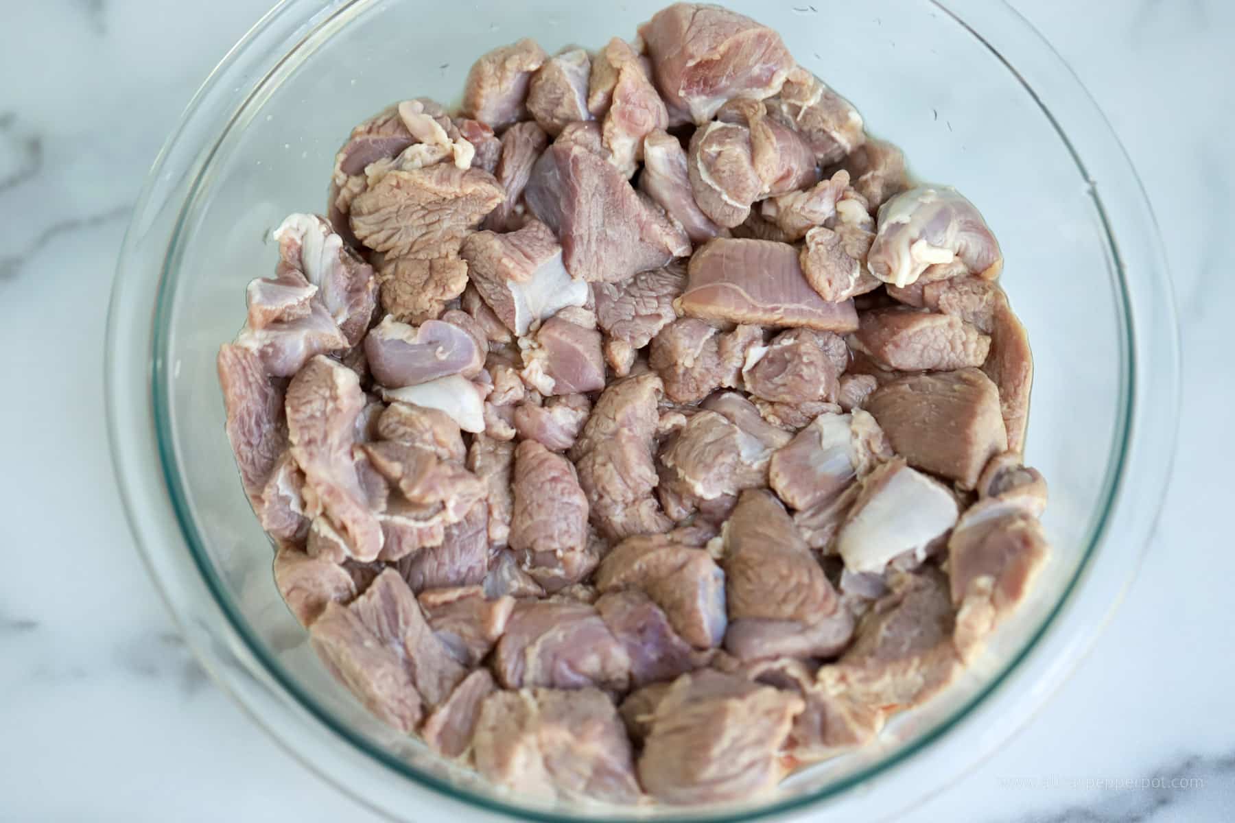 Lamb chunks after being washed with lime, rinsed and dried.