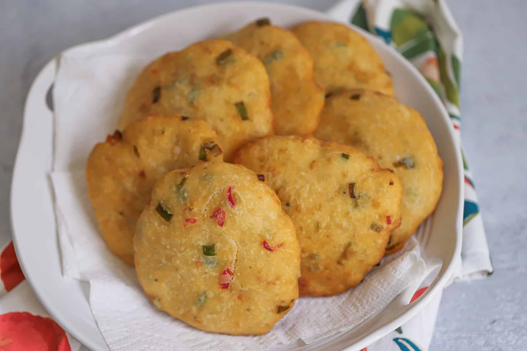 Scallion and wiri wiri pepper fry bake in a white platter