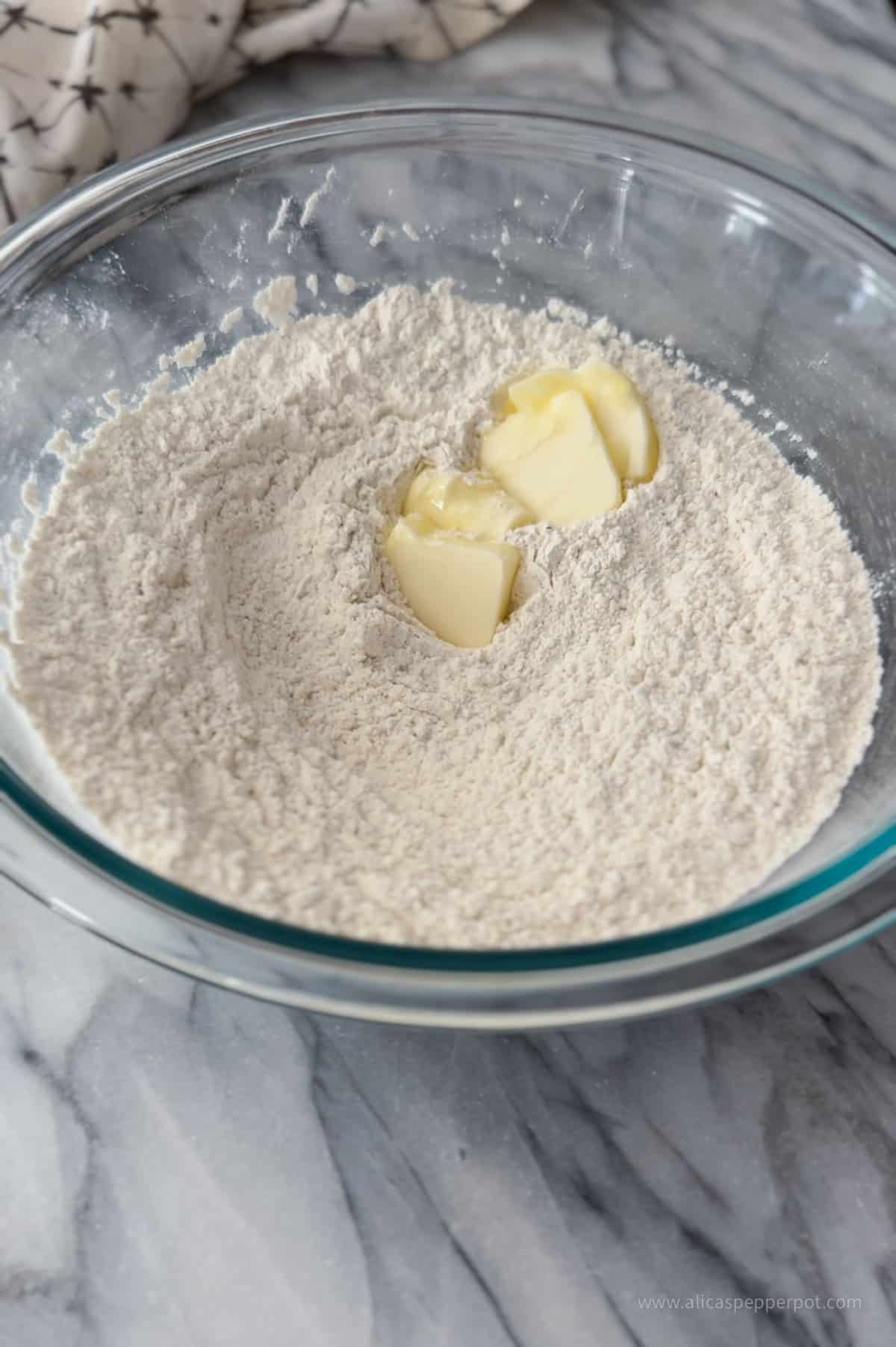 Bowl of flour mix with butter added