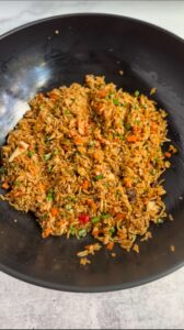 Small batch fried rice in black wok