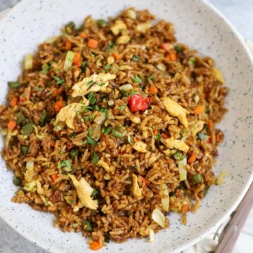 Image of small batch fried rice in speckled serving dish.